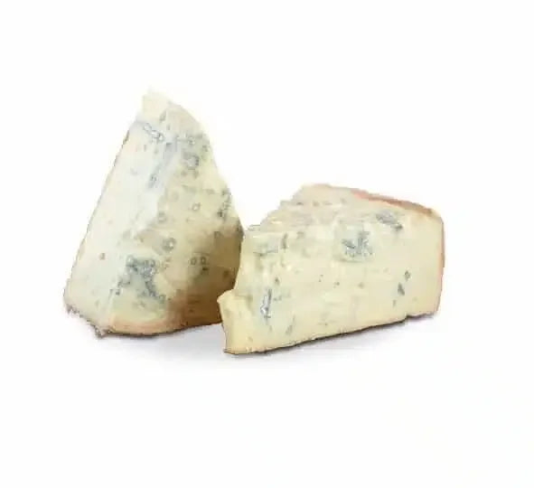 Two wedges of creamy Gorgonzola Dolce blue cheese with white and blue mold veins on white background