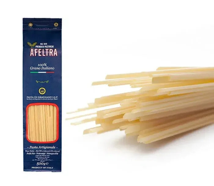 Pack of Afeltra Linguine pasta 500g with close-up of uncooked linguine strands on white background