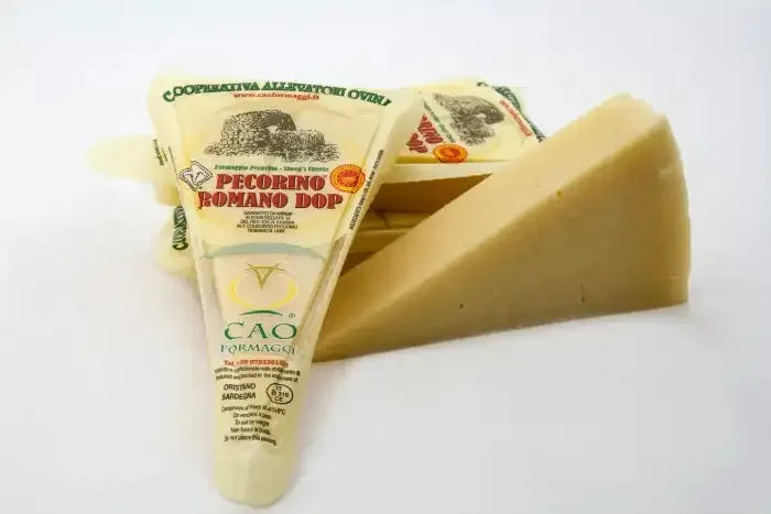 Wedges of Pecorino Romano DOP cheese with CAO Formaggi labels on white background