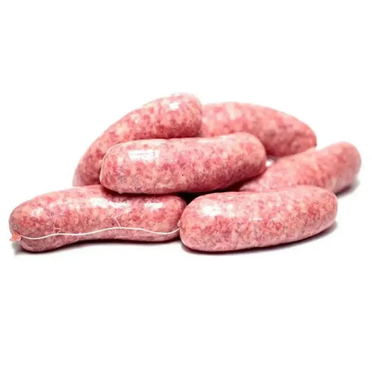 Fresh raw Italian sausage links piled on white background, showcasing texture and marbling
